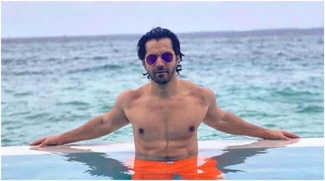 Varun Dhawan Raising Hotness Bar In Pool With Six Pack!