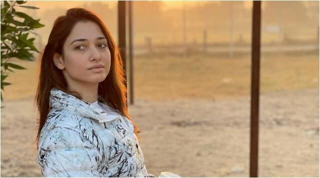 Tamannaah Bhatia Enjoying Early Morning Scenery And Illustrating Her No Makeup Glow With A Cup Of Coffee.