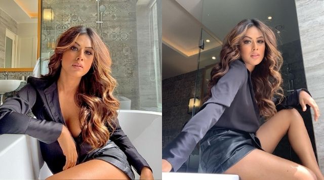 Nia Sharma Partial Sunbath Pictures In Black Dress Are A Treat To Watch.