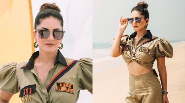 Sunny Leone Looks Enchanting As She Walks Along The Beach On a Sunny Day.