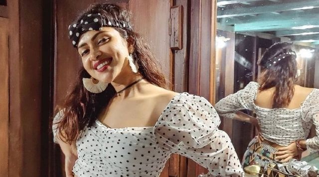 Amala Paul Looks Fascinating In This Retro Avatar.