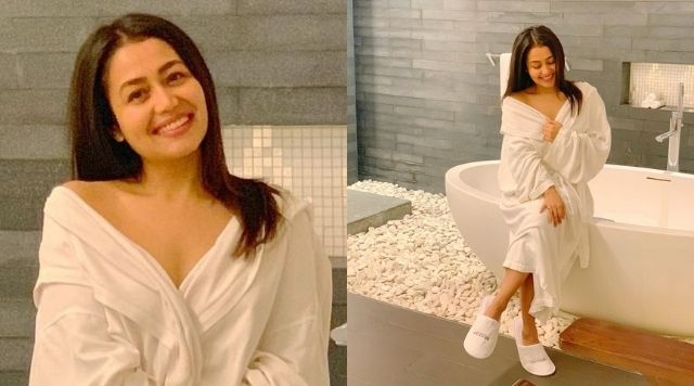 Neha Kakkar’s Sizzling Hot Pictures In Bathrobe Gets A Romantic Compliment From Hubby.